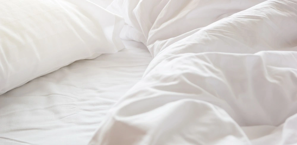 weisse bettwasche
